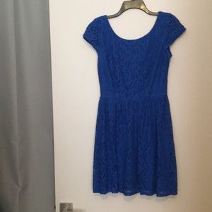 Cap sleeved, bright blue lace dress, with zip back